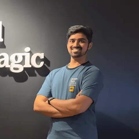 Clef D'Souza, a Uhtend Pass subscriber, standing with arms crossed
